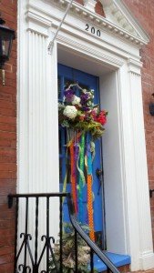 Colorful doors become even more spectacular with flowers and ribbons on May Day in Annapolis